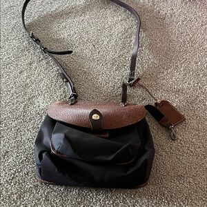 Dooney & Bourke Rich Brown Leather Tag